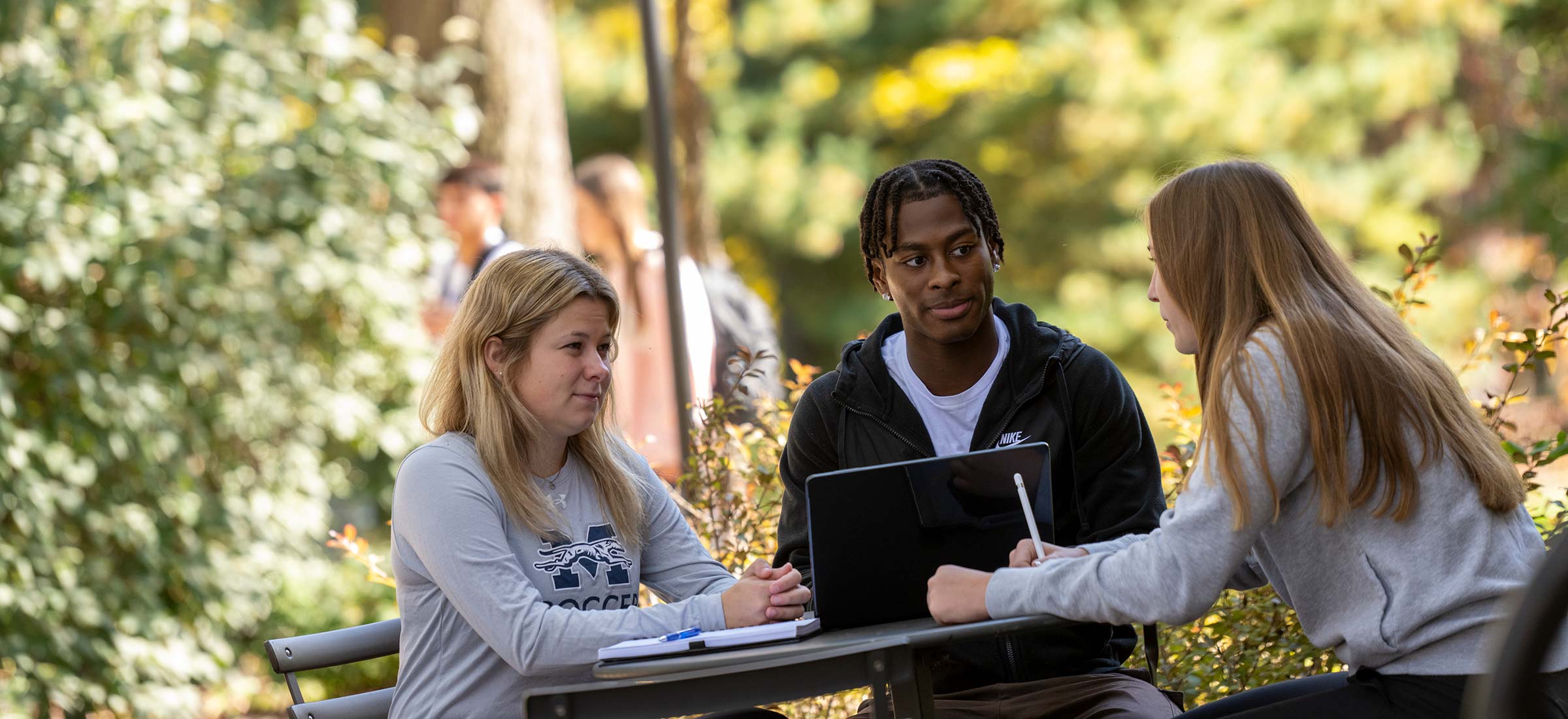 Students sitting outside